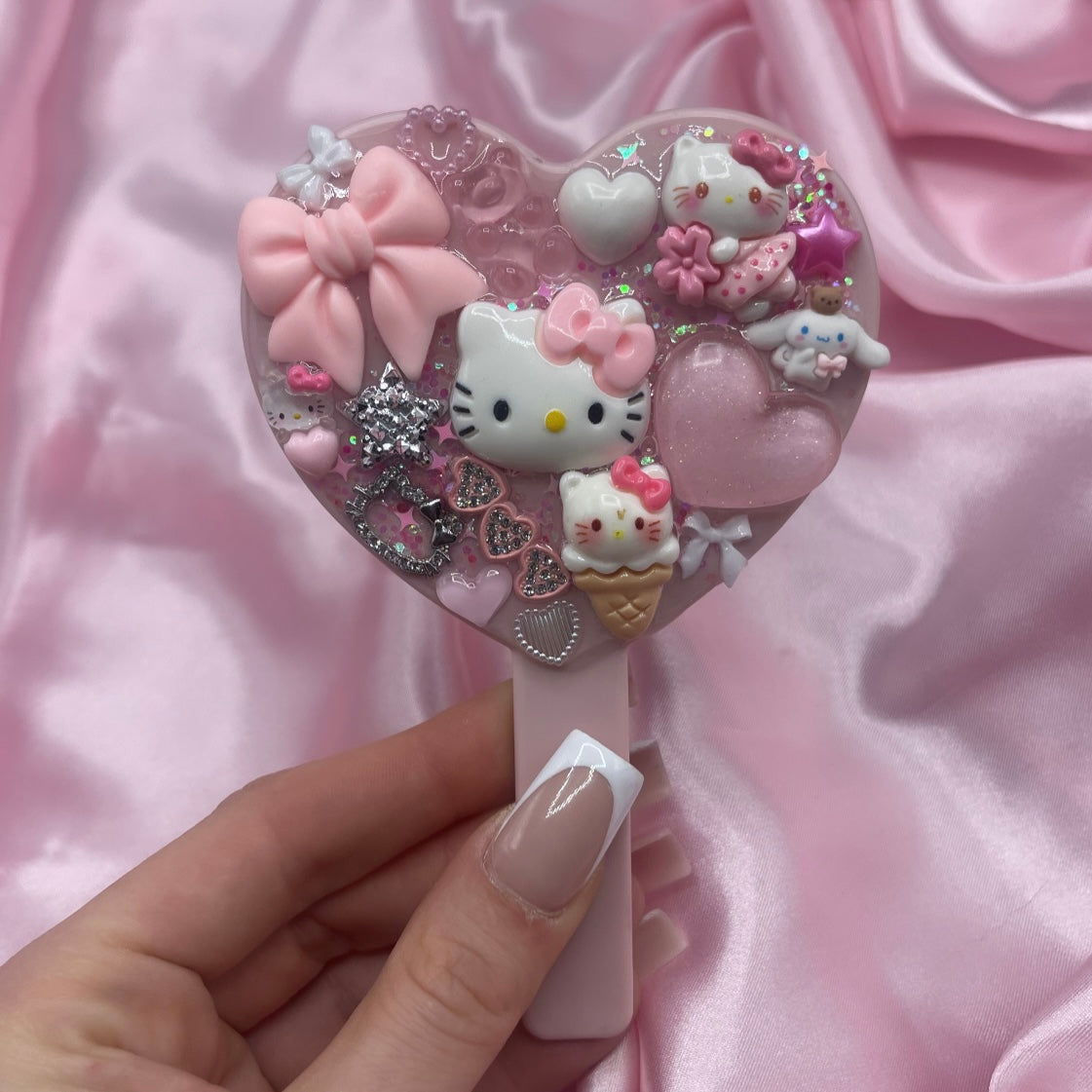 Handheld kawaii junk mirror