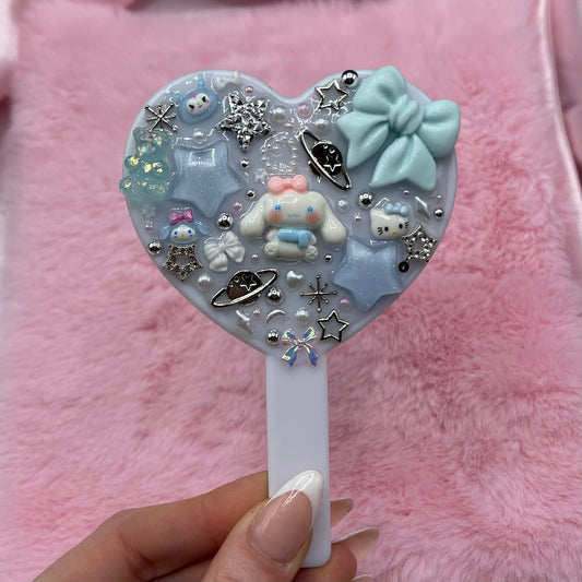 Handheld kawaii junk mirror