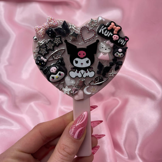 Handheld kawaii junk mirror