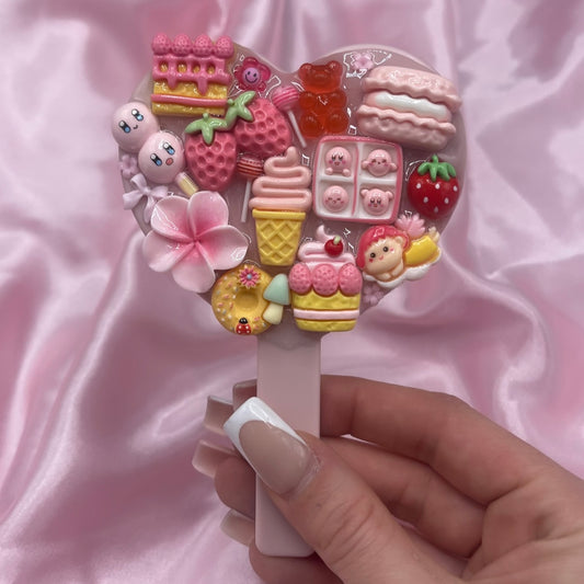 Handheld kawaii junk mirror
