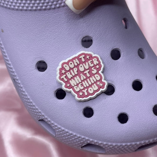 Don’t trip over what’s behind you croc charm