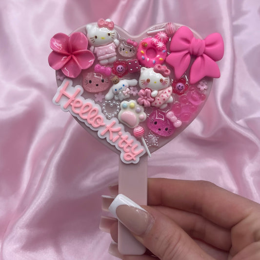 Handheld kawaii junk mirror