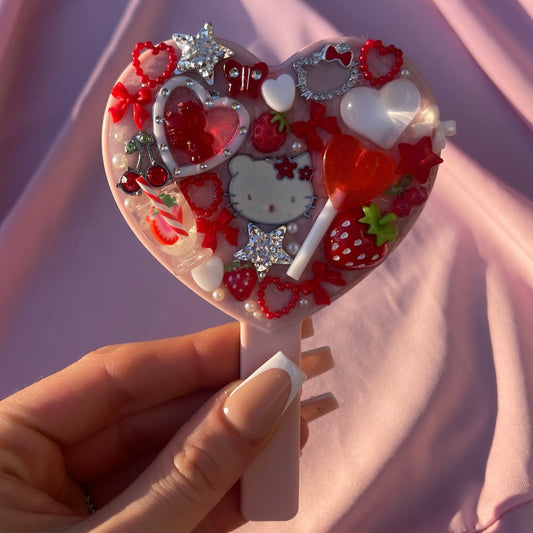 Handheld kawaii junk mirror