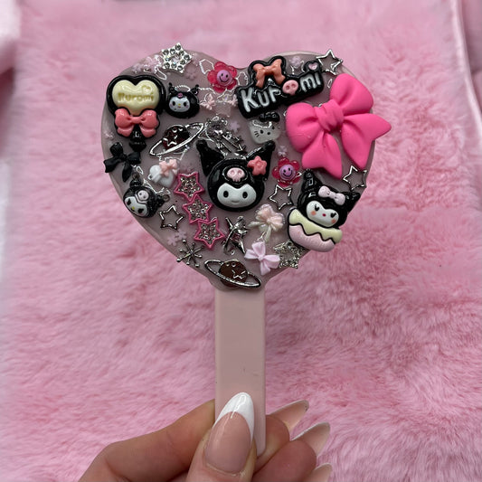 Handheld kawaii junk mirror