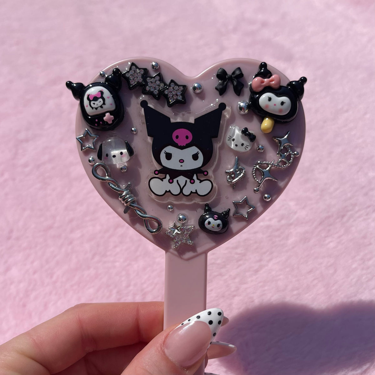 Handheld decorated mirrors