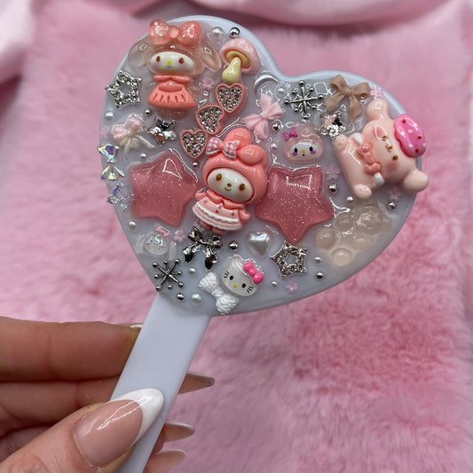 Handheld kawaii junk mirror