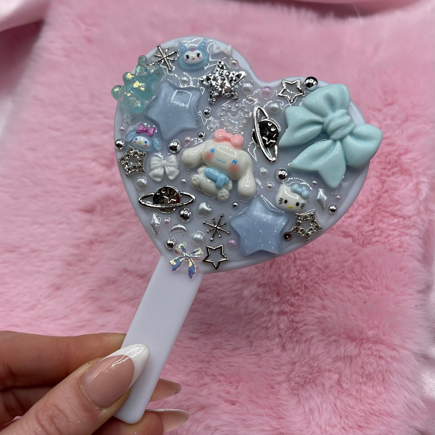 Handheld kawaii junk mirror