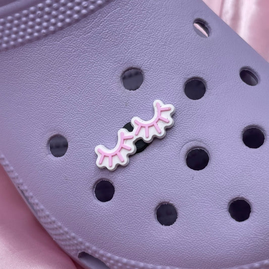Lashes Croc charm