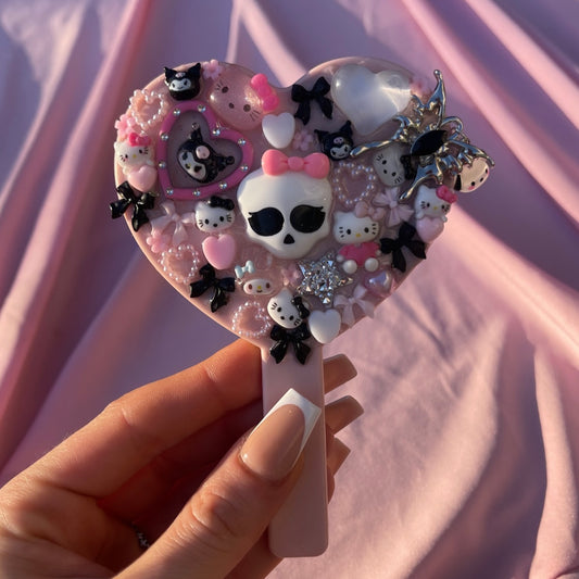 Handheld kawaii junk mirror