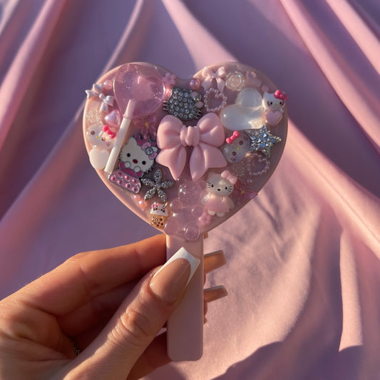Handheld kawaii junk mirror