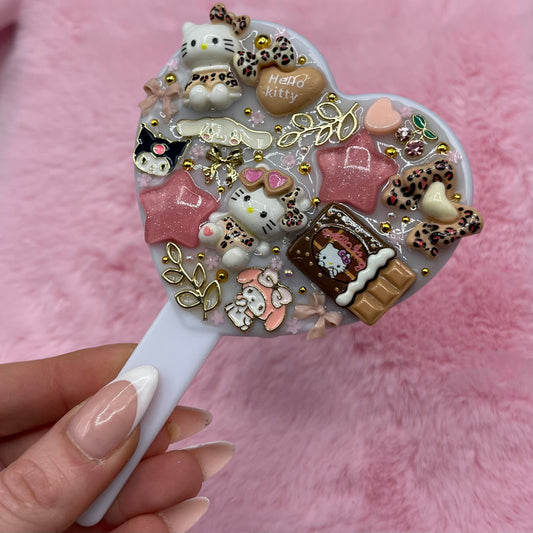 Handheld kawaii junk mirror