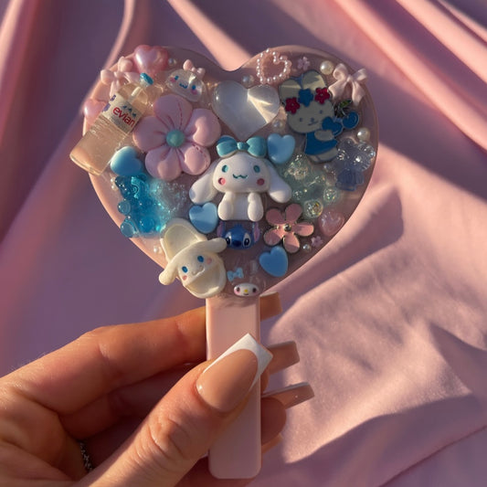 Handheld kawaii junk mirror