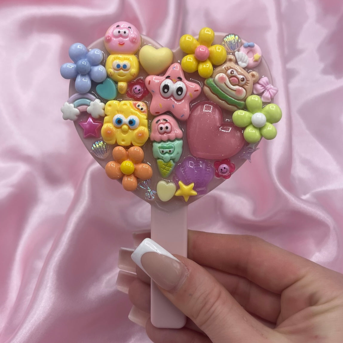 Handheld cartoon junk mirror