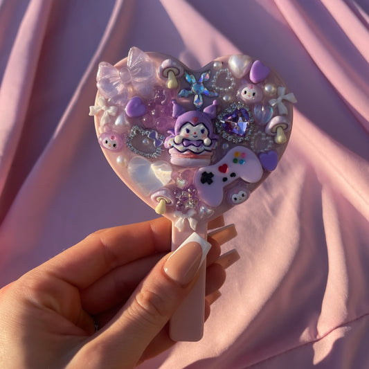 Handheld kawaii junk mirror