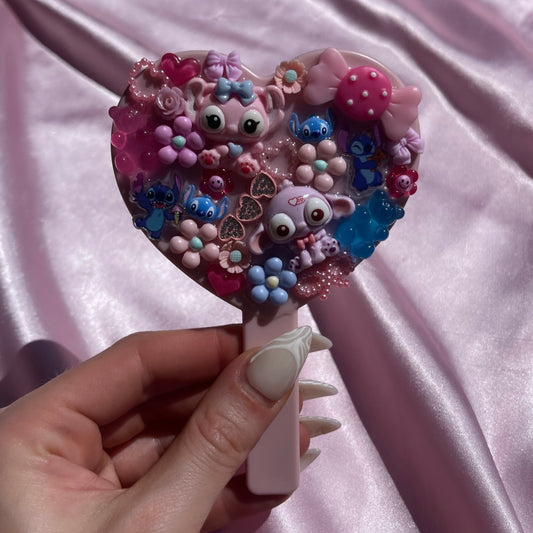 Handheld stitch junk mirror