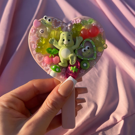 Handheld kawaii junk mirror