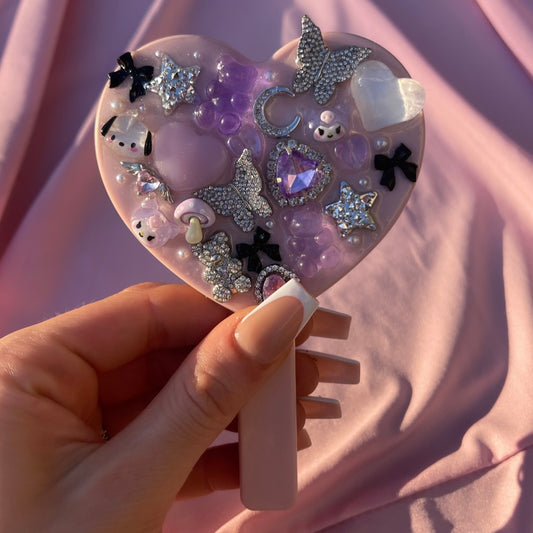 Handheld kawaii junk mirror